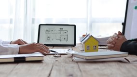 The businessman consulted the design of the housing estate and discussed the terms of the real estate purchase agreement. - Powered by Shutterstock - Get 15% off with code: PIKWIZARD15