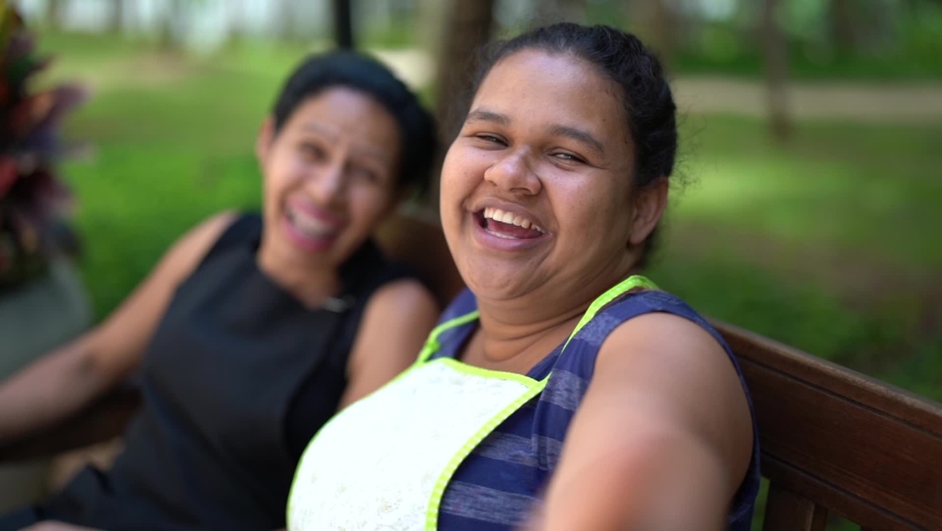 Friends housekeeper in talking and gossiping at bench park
 | Shutterstock HD Video #1095962081