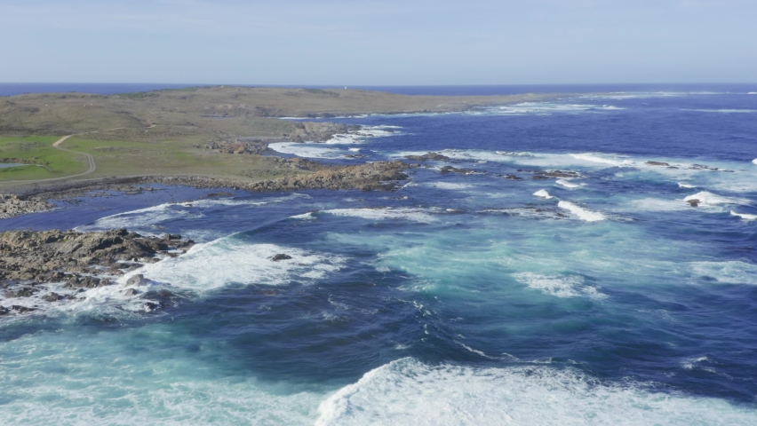 Drone aerial footage of the rugged and rocky coastline at Stokes Point on Bass Strait on King Island in Tasmania in Australia