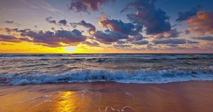 Tropical island beach and scenic ocean sunrise with colorful sky clouds, 4k video of waves and sea sand
