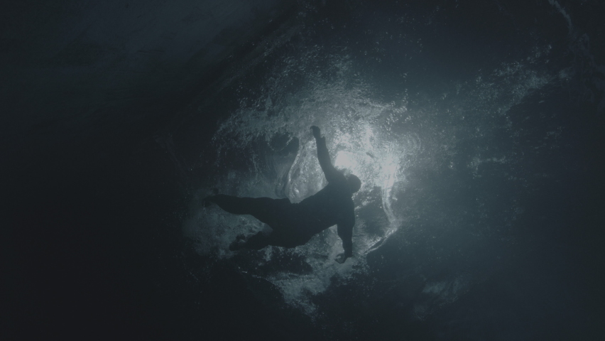 man falling in to the water, under the water, diving, drown man, under the sea
