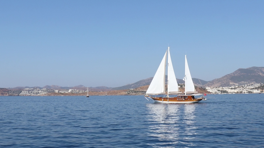 A sailing boat sailing on the open sea in Bodrum Turkey in the Aegean Sea. Royalty-Free Stock Footage #1095997507