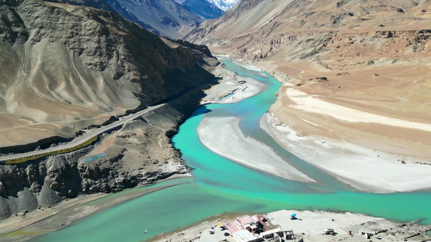 Confluence of the Indus and Zanskar Rivers. Aerial view from drone fly over  along the beautiful river and mountain. Tourist attraction in Leh , Ladahk , India 