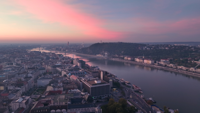 Aerial view of Budapest city skyline at sunrise. Elisabeth Bridge, the third newest bridge of Budapest, Hungary, connecting Buda and Pest across the River Danube | Shutterstock HD Video #1096024463