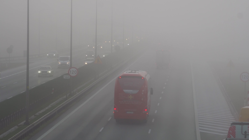 Highway A2 near Poznan in foggy autumn day Royalty-Free Stock Footage #1096024671