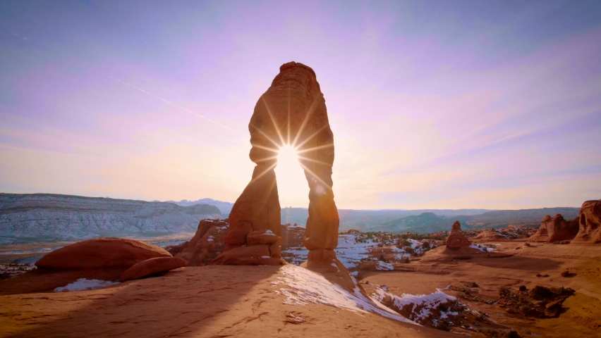 A beautiful sunlight at popular landmark Delicate Arch in Arches National Park, Utah, USA