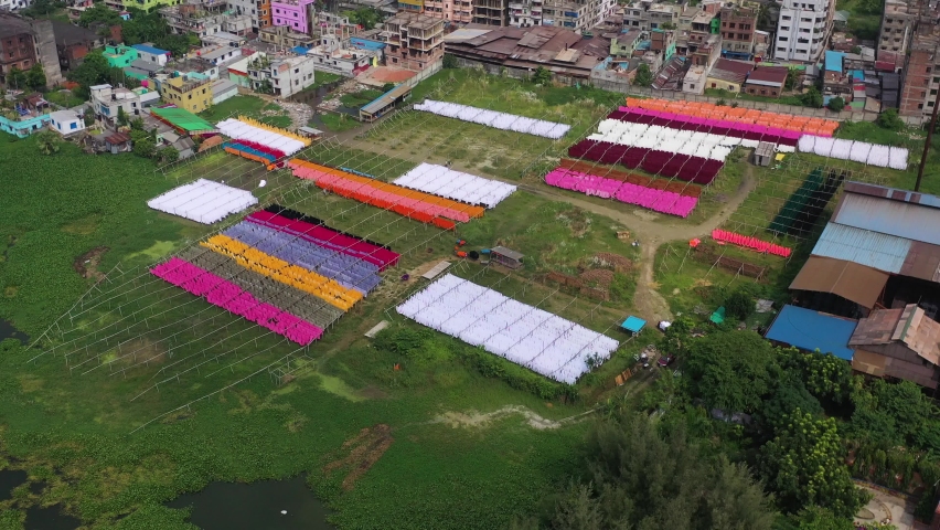 Aerial view of colourful fabric hanged to dry in Narayanganj, Bangladesh.