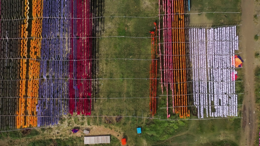 Aerial view of colourful fabric hanged to dry in Narayanganj, Bangladesh.