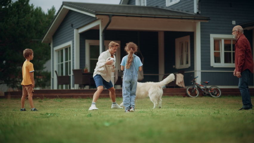 Grandfather Playing Ball with His Son and Grandchildren. Family Members Spending Leisure Time Outside with Kids and Pet Dog. Young Adult Play Ball with Golden Retriever, Having Fun in Front Yard. Royalty-Free Stock Footage #1096061567