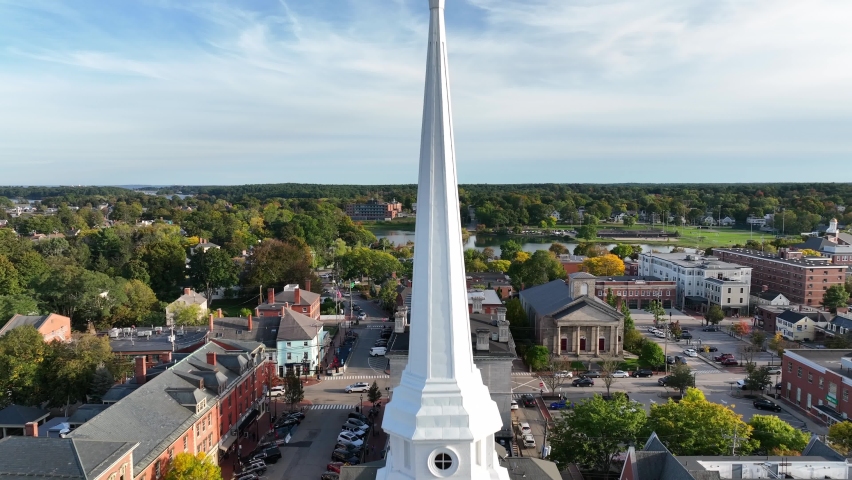 Market Square in Portsmouth New Hampshire. Rising aerial reveal of historic town in golden hour light.