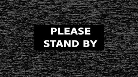 Disrupted signal on TV screen with text please stand by. Interference due to an accident at a transmitting station