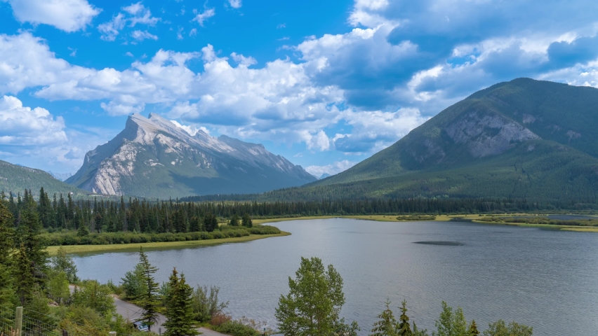 4K time-lapse UHD video of Vermilion Lakes with Mount Rundle and Sulphur Mountain in the background, Alberta, Canada. summer autumn foliage scenery in Banff National Park, Canadian Rockies