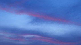 4K timelapse video : Beautiful colorful clouds in the sunset sky. loop of clouds background. winter sky. weather concept.
