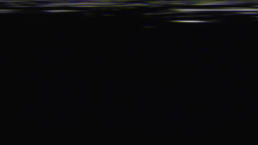 Old retro square television on green and yellow neon background, screen with ripples and interference