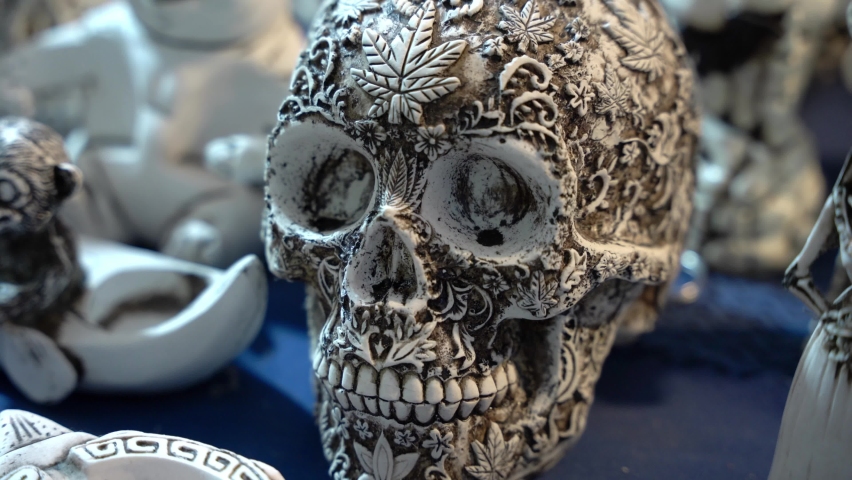 Ceramic skull for sale at the market Royalty-Free Stock Footage #1096095503
