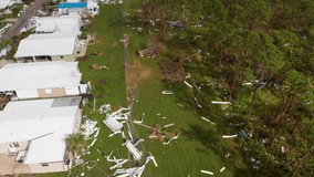 4K Drone Video of Debris in Forest from Homes Destroyed by Hurricane Ian in North Port, Florida - 18