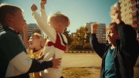 Young Caucasian Boy Playing Soccer with Diverse Friends. Multiethnic Kids Enjoying a Game of Football in the Neighborhood. Player Celebrating the Goal with Teammates. Fast Paced Tracking Shot. - Powered by Shutterstock - Get 15% off with code: PIKWIZARD15