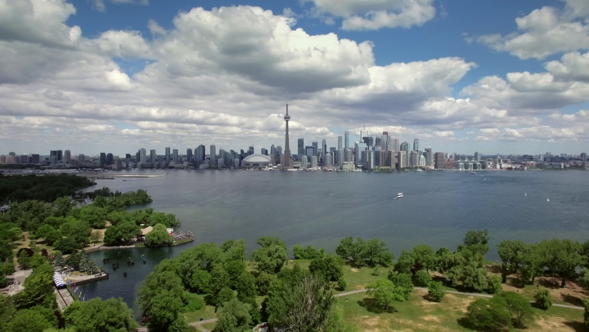 Aerial view of Toronto skyline and Lake Ontario by day in Toronto, Ontario, Canada. 