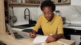 African American studying online course at home