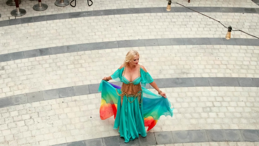 professional belly dancer performing with authentic costume
