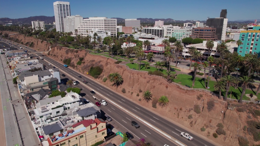 SANTA MONICA, OCTOBER 2022. Aerial Drone Shot of Pacific Coast Highway by Santa Monica Beach in Los Angeles, California, United States. Pier Pacific Ferris Wheel. Aerial Dolly, Wide Angle Shot 4K