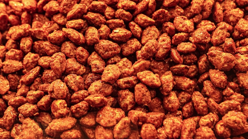 Candied almonds detail texture image at funfair stall