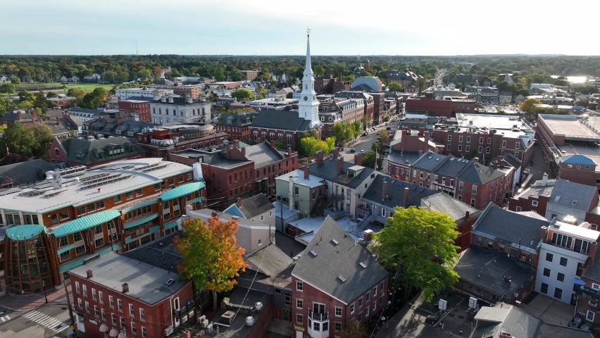 Portsmouth , NH , United States - 09 30 2022: Market Square church and steeple. Portsmouth New Hampshire, New England town in autumn fall foliage. Aerial view.