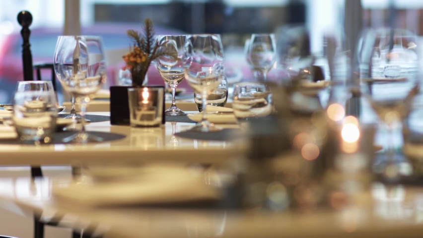 Shallow focus of the restaurant table set before dinner
