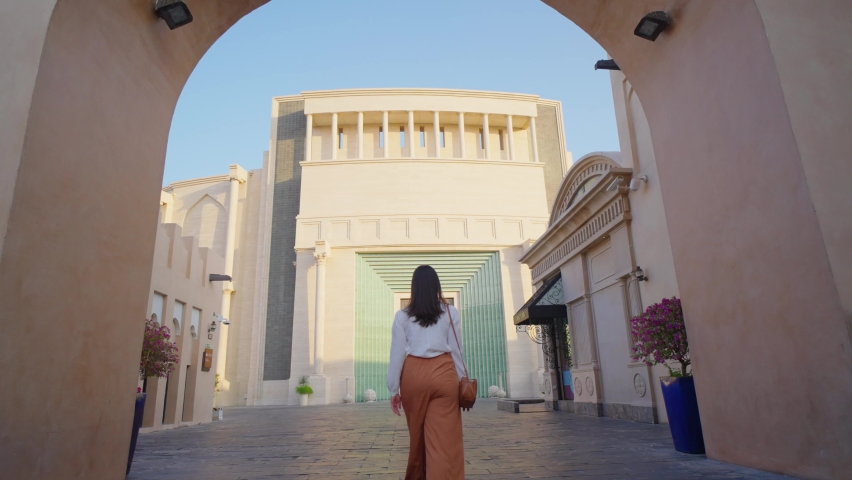 Tourist walking at Katara Cultural Village in Doha, Qatar
