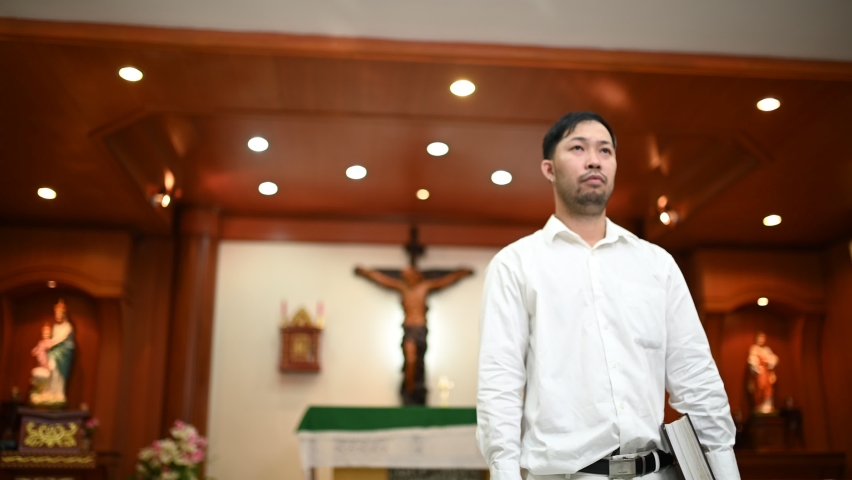 Christian man asking for blessings from God,Asian man praying to Jesus Christ | Shutterstock HD Video #1096157377
