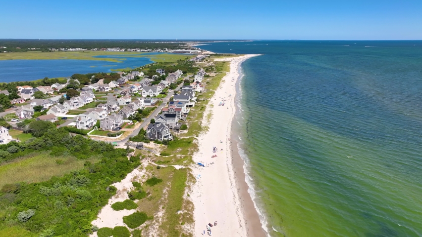 Seagull Beach and Sea Gull Lighthouse aerial view in summer in West Yarmouth, Cape Cod, Massachusetts MA, USA.  Royalty-Free Stock Footage #1096177519