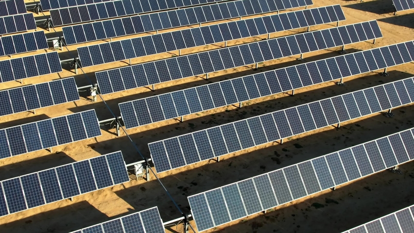 Aerial View of Solar Plant, Massive Array of Solar Panels in Mojave Desert, California USA