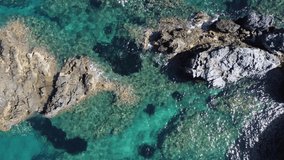 Aerial view of transparent blue Mediterranean water on the coast of Samos, Greek Aegean Sea