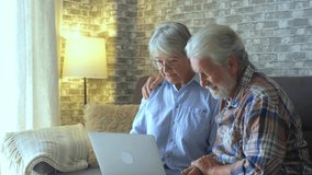 Couple of two cute seniors buying on internet on online stores and looking outdoor waiting delivery man to receive their package. - Powered by Shutterstock - Get 15% off with code: PIKWIZARD15