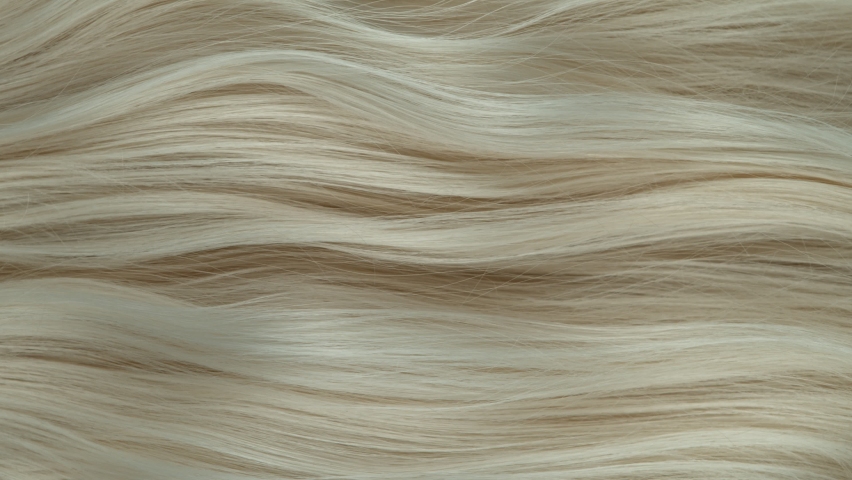 Super slow motion of wavy blonde hair in detail. Filmed on high speed cinema camera, 1000 fps. Royalty-Free Stock Footage #1096197097