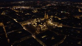 Establishing Aerial View of Krakow, Old Town, Cracow, Poland, Polska. Krakow, Poland. View of the St. Joseph's Catholic Church in Podgorze, Krakow, Poland at night. 