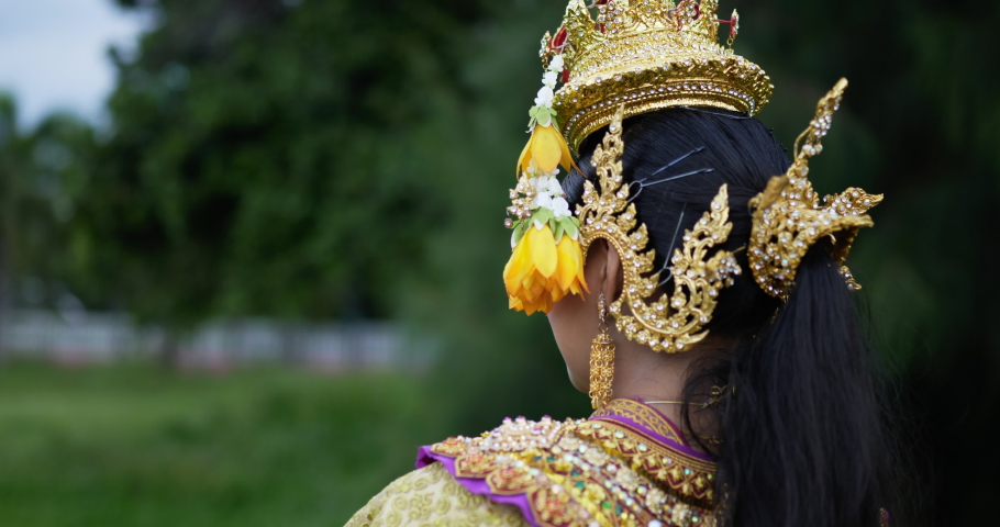Close up face of Thai woman in traditional dress looking at camera.Thailand culture and thai dancing concept.