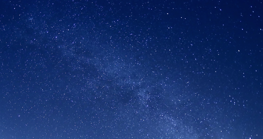 Night starry sky, milky way in night horizon, beautiful dark day time, stars shining, white. Star trails rolling. Nice clear weather.