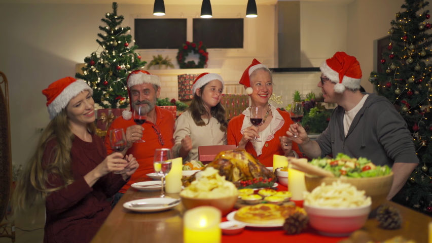 A group of caucasian. Portrait of western white family have a celebration dinner in party on Merry Christmas Eve Xmas on holiday at home. People lifestyle. thanksgiving holiday