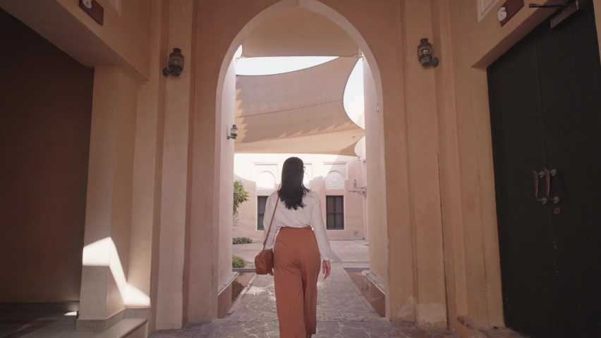  Tourist walking at Katara Cultural Village in Doha, Qatar
