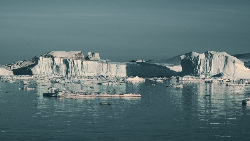 Go everywhere. Antarctica, icebergs, view from cruise ship. Amazing beautiful views of Nature and landscape of snow, ice and white of Antarctic. Moving Ice Floes and Ice Sheets in the Antarctic Sea.