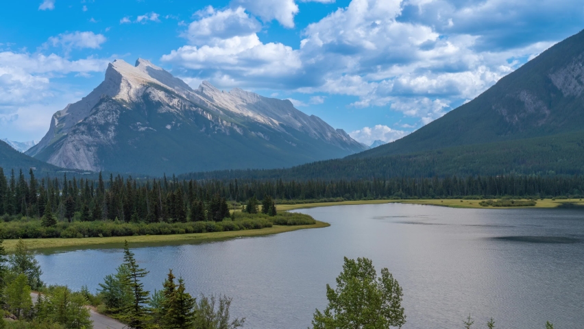 4K time-lapse UHD video of Vermilion Lakes with Mount Rundle and Sulphur Mountain in the background, Alberta, Canada. summer autumn foliage scenery in Banff National Park, Canadian Rockies