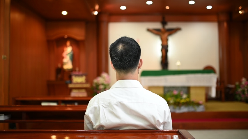 Christian man asking for blessings from God,Asian man praying to Jesus Christ