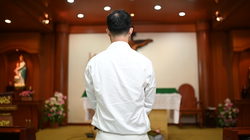 Christian man asking for blessings from God,Asian man praying to Jesus Christ | Shutterstock HD Video #1096219299