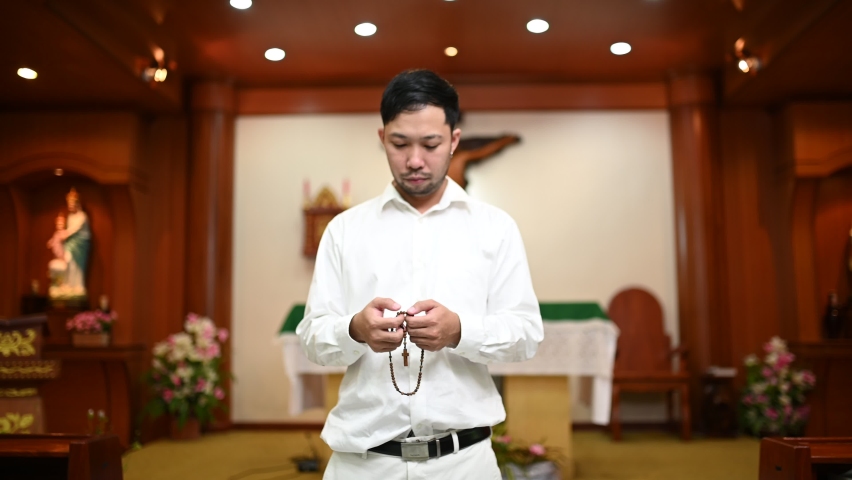 Christian man asking for blessings from God,Asian man praying to Jesus Christ | Shutterstock HD Video #1096219301