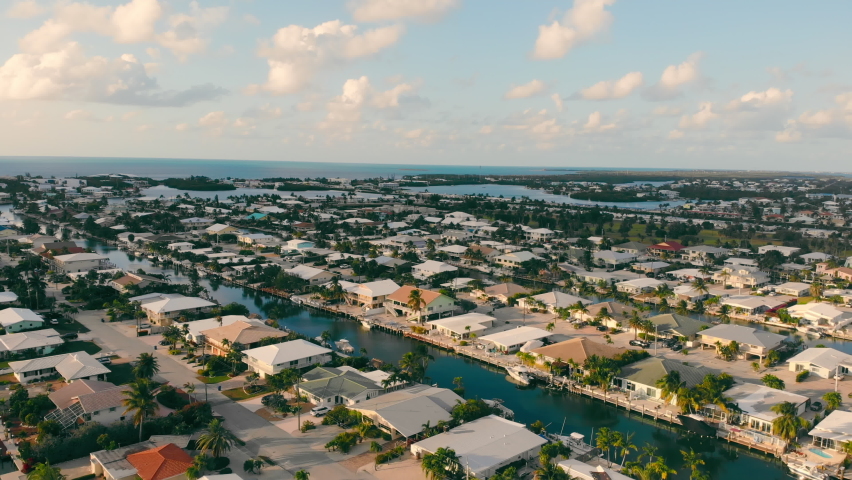 High up aerial view of Key Colony Beach is a municipality in the middle of the Florida Keys, Monroe County, Florida, United States. Royalty-Free Stock Footage #1096223751