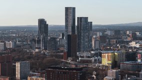 Establishing Aerial View Shot of Manchester UK, City Skyline England United Kingdom, skyscrapers day