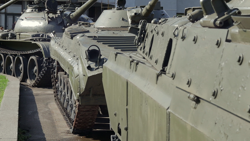 A column of armored vehicles and tanks. National Armed Forces. Military equipment and troops. War in Ukraine. Building or building combat vehicles. Armored weapons. means of the armed forces.