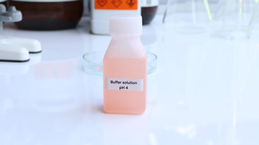 Buffer solution in glass, chemical in the laboratory and industry, Chemicals used in the analysis