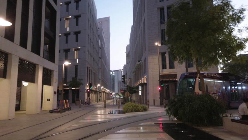 Doha, Qatar - Jun 20,2022: Sustainable gree energy public transportation tram in Qatar, Doha district of Msheireb downtown of Doha Royalty-Free Stock Footage #1096260787